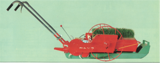 赤い人力式田植え機